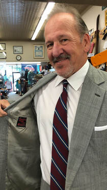 Lifetime Customer wearing a sports coat by Varsity Style that he bought from Bernard's 25 years ago.
